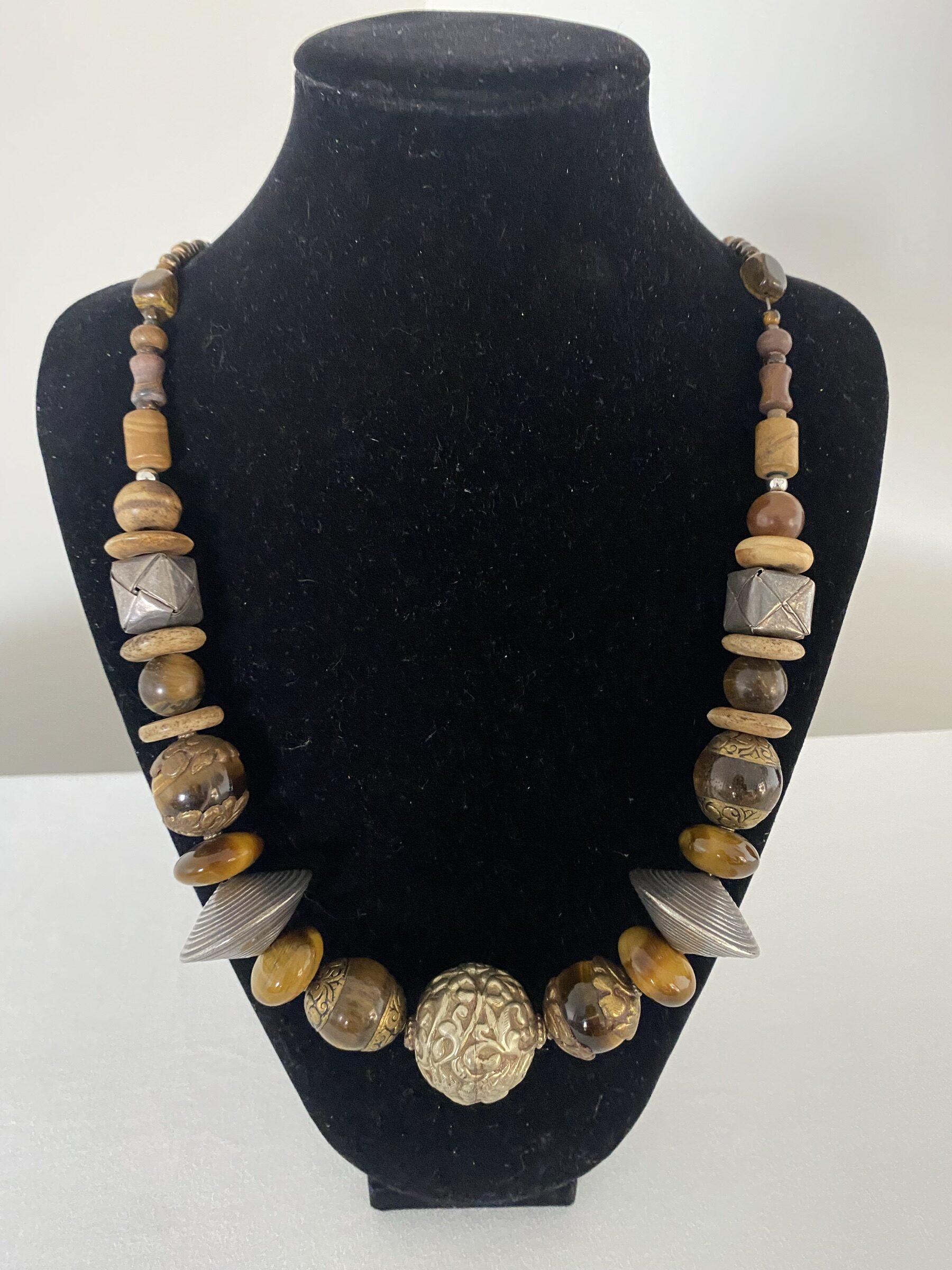 African Tiger Eye necklace by Naga By Nevara — tiger eye beads with sterling silver, bone, origami silver and coconut wood, 69cm.