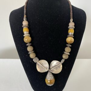 Amber and Silver Pendant by Naga By Nevara — antique amber and silver beads with sterling silver and quartz, 56cm.