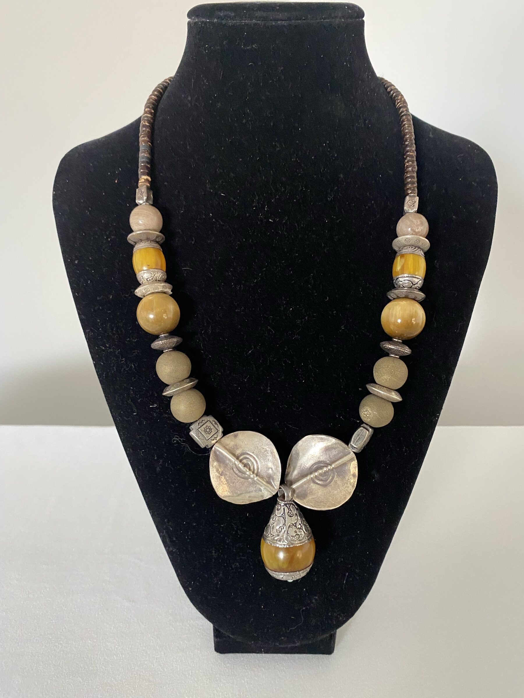 Amber and Silver Pendant by Naga By Nevara — antique amber and silver beads with sterling silver and quartz, 56cm.