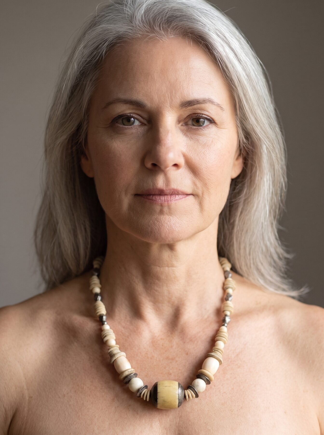 Antique Ivory necklace by Naga By Nevara worn by a model, front view