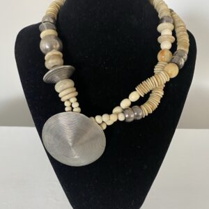 Big Silver Dome Pendant by Naga By Nevara — ostrich egg discs separated by silver beads and white jade beads, 47cm.