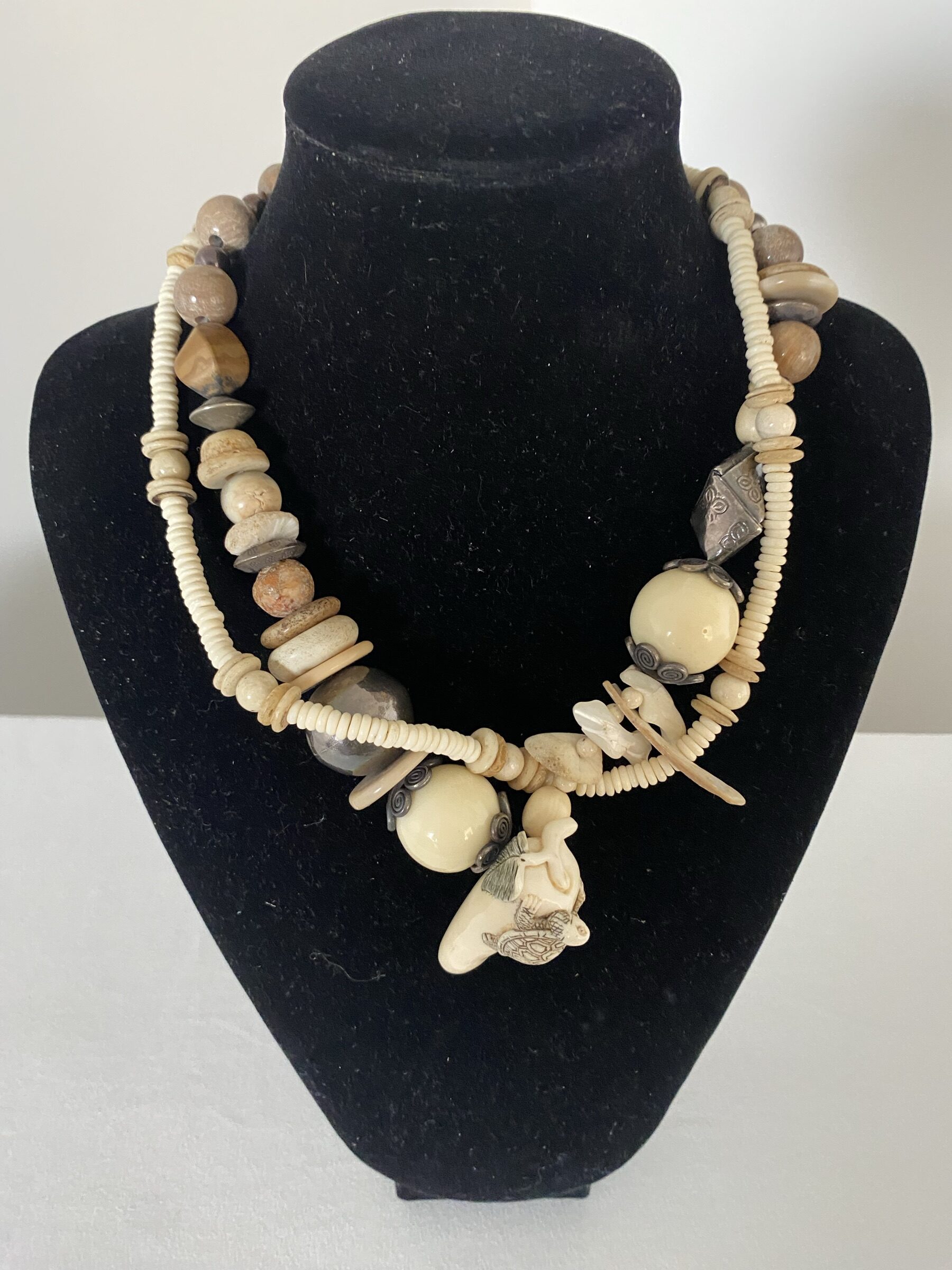 Netsuke with Turtle necklace by Naga By Nevara — white coral, niihau shells, origami silver, river stone and mother of pearl, 45cm.