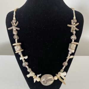 Ocean Gifts necklace by Naga By Nevara — fish, starfish, shells and origami silver with mother of pearl and niihau shells, 70cm.