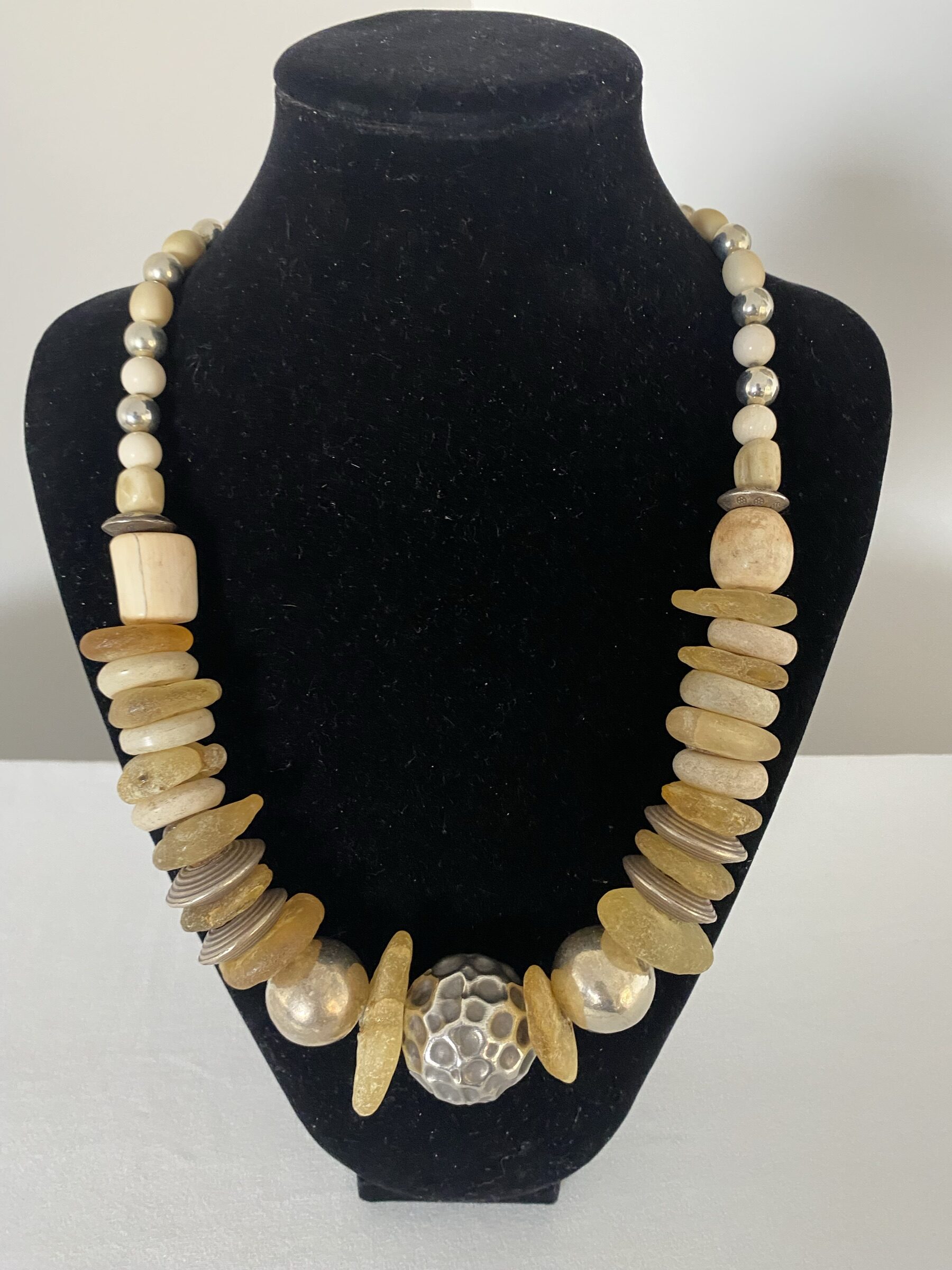 Raw Amber necklace by Naga By Nevara — large sterling silver beads with bone, white coral and raw amber, 62cm.